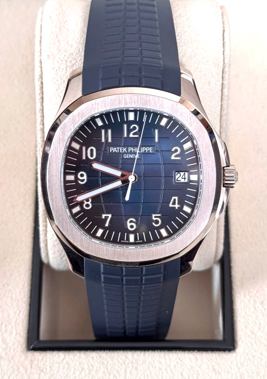 Patek Philippe Aquanaut 5168G-001 in white gold with blue embossed dial and blue composite strap, straight-on front view in the presentation box