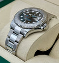 Rolex Yacht-Master 40 ref. 126622 with slate dial, platinum bezel and Oyster bracelet, right-angled front view on a cushion