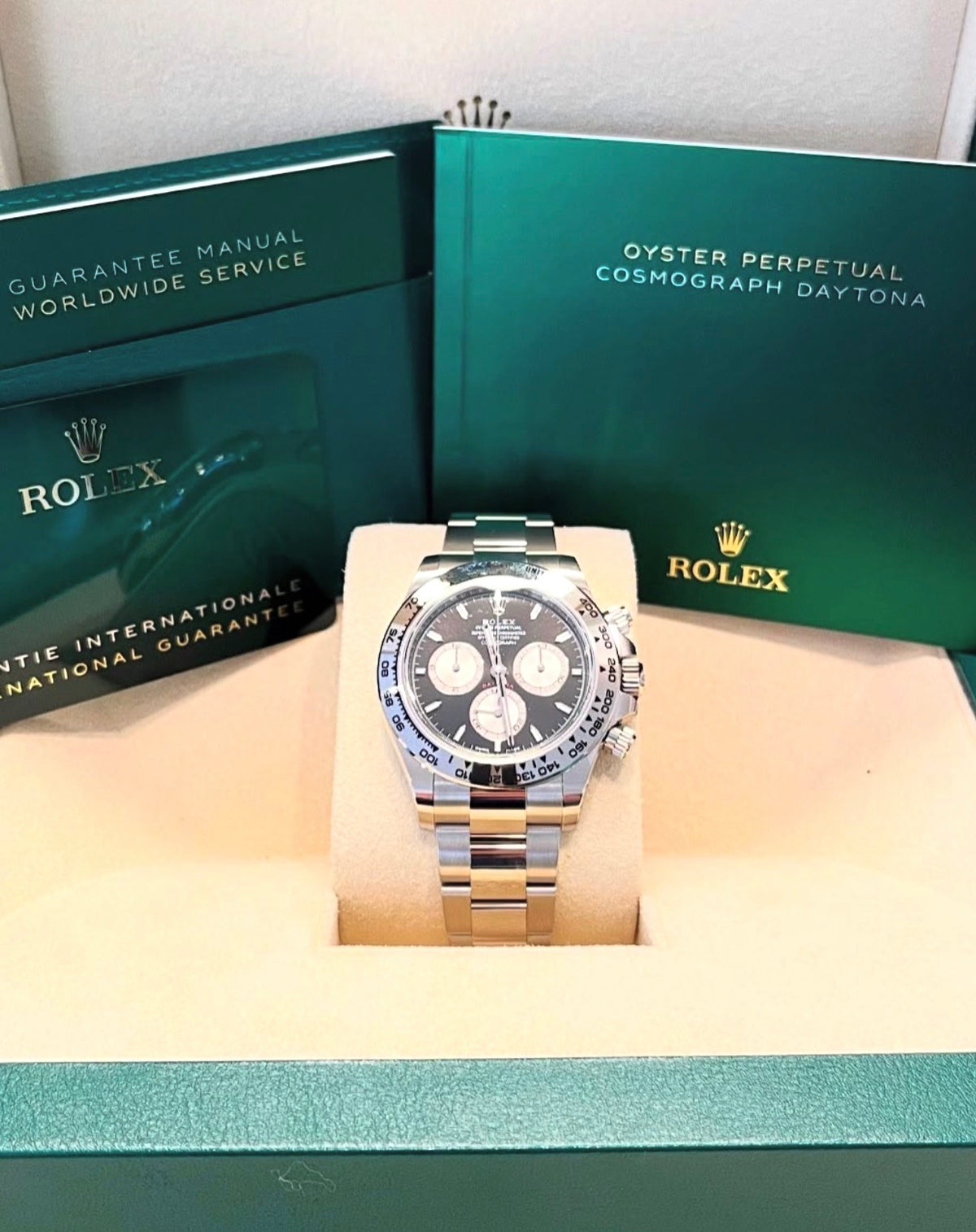 Rolex Cosmograph Daytona 126509 bright black dial with Rolex box, booklets and guarantee card, front view