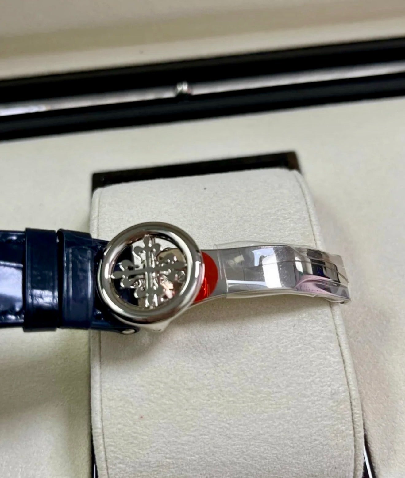 Patek Philippe Annual Calendar 5396G-017 in white gold with blue dial and blue alligator strap, rear view of the blue strap and deployant clasp