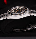 Tudor Black Bay 58 M7939A1A0NU-0001, black dial and bezel with five-link steel bracelet, left three-quarter dial and bezel view