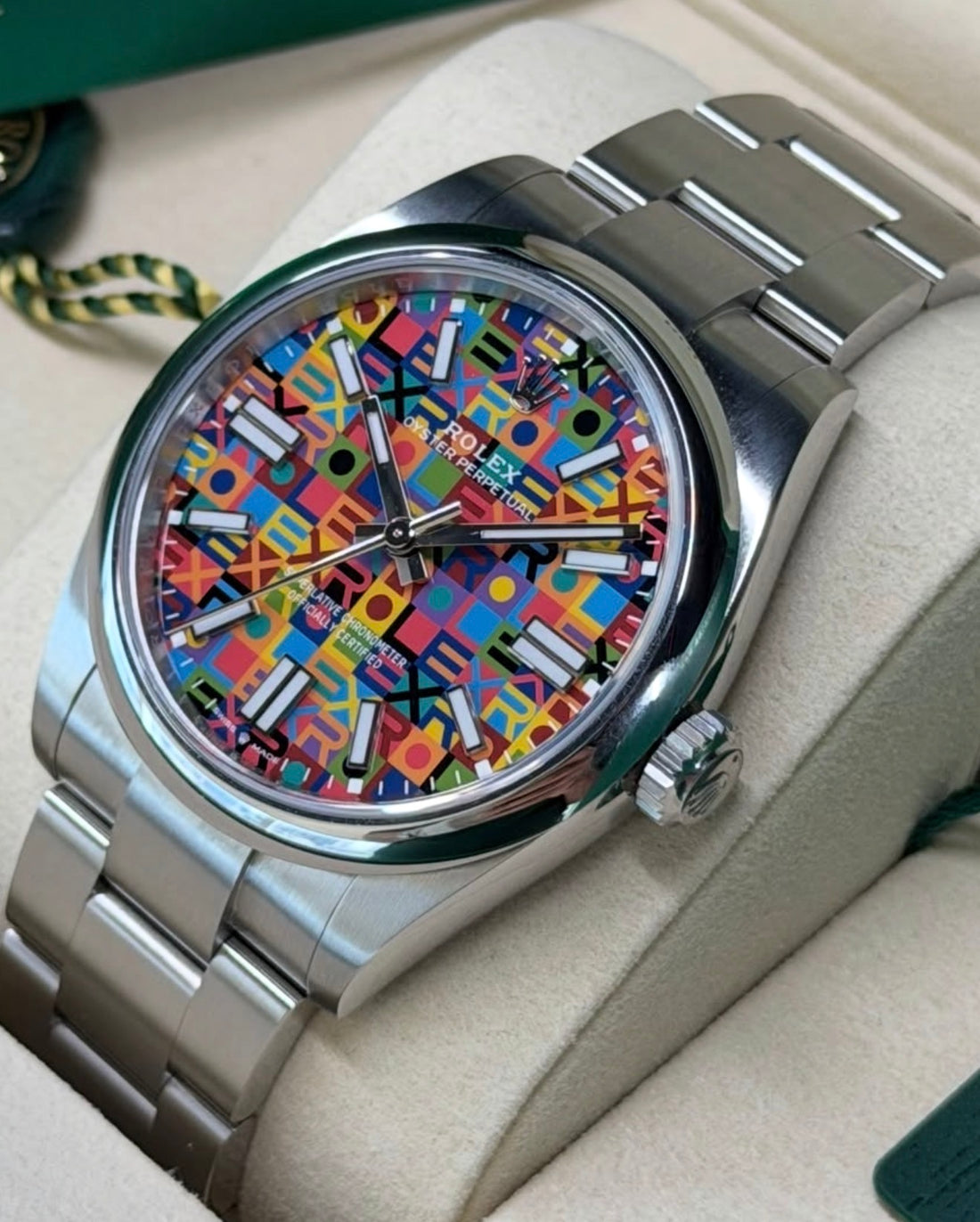 Rolex Oyster Perpetual 41 reference 134300 with multicoloured Jubilee-motif dial on Oystersteel Oyster bracelet, close angled front view
