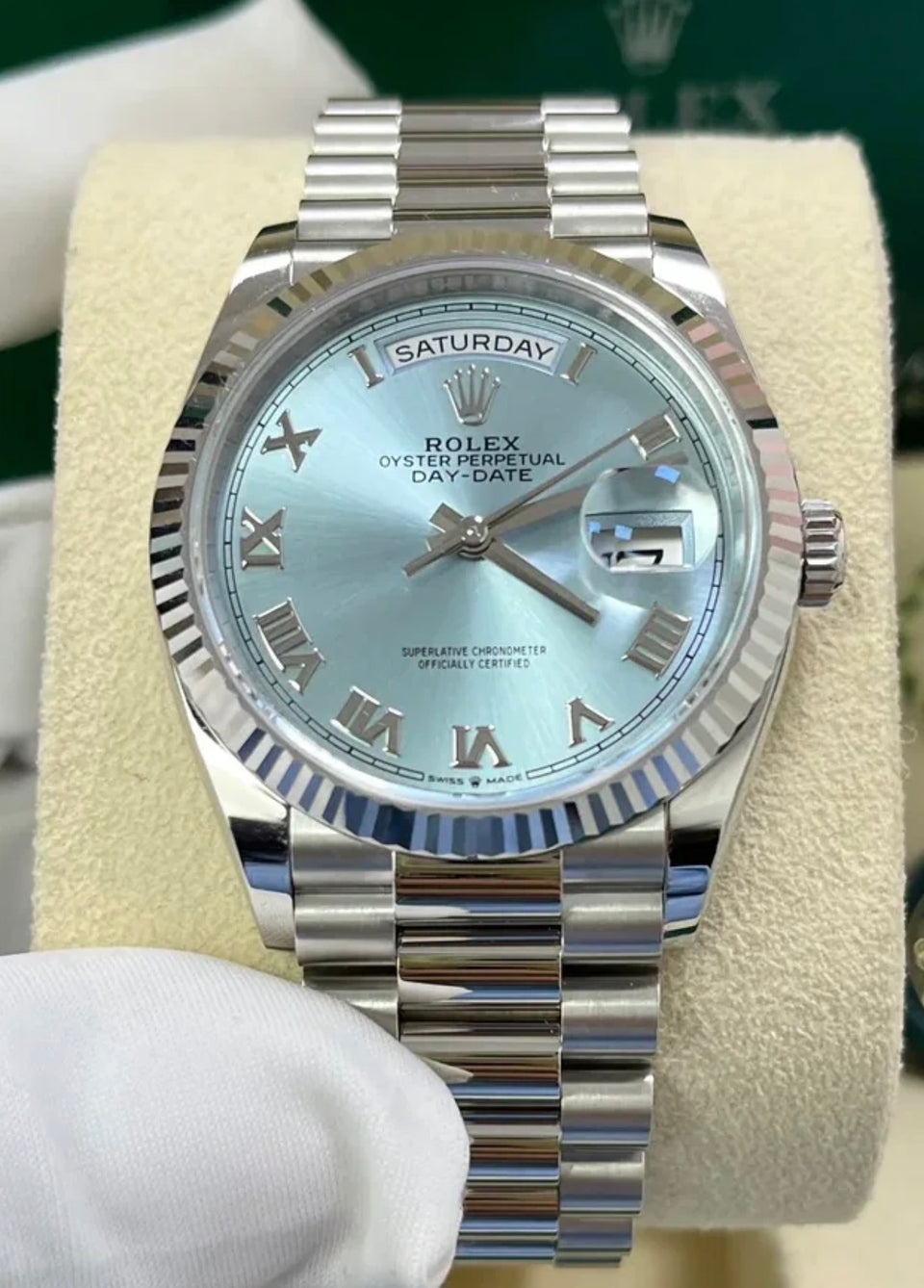 Rolex Day-Date reference 128236 with ice-blue Roman-numeral dial, platinum case and President bracelet
