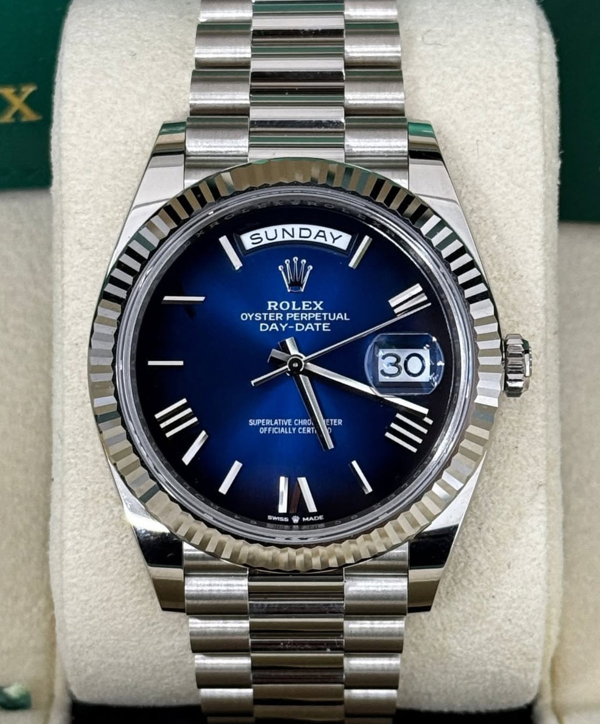 Rolex Day-Date 40 reference 228239 blue ombré Roman numeral dial in white gold, straight-on front view