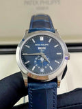 Patek Philippe Annual Calendar 5396G-017 in white gold with blue dial and blue alligator strap, straight-on handheld front view