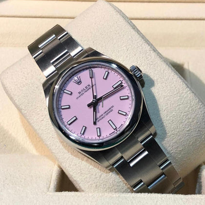 Rolex Oyster Perpetual 31 ref. 277200 with candy-pink dial on Oystersteel Oyster bracelet, three-quarter front view