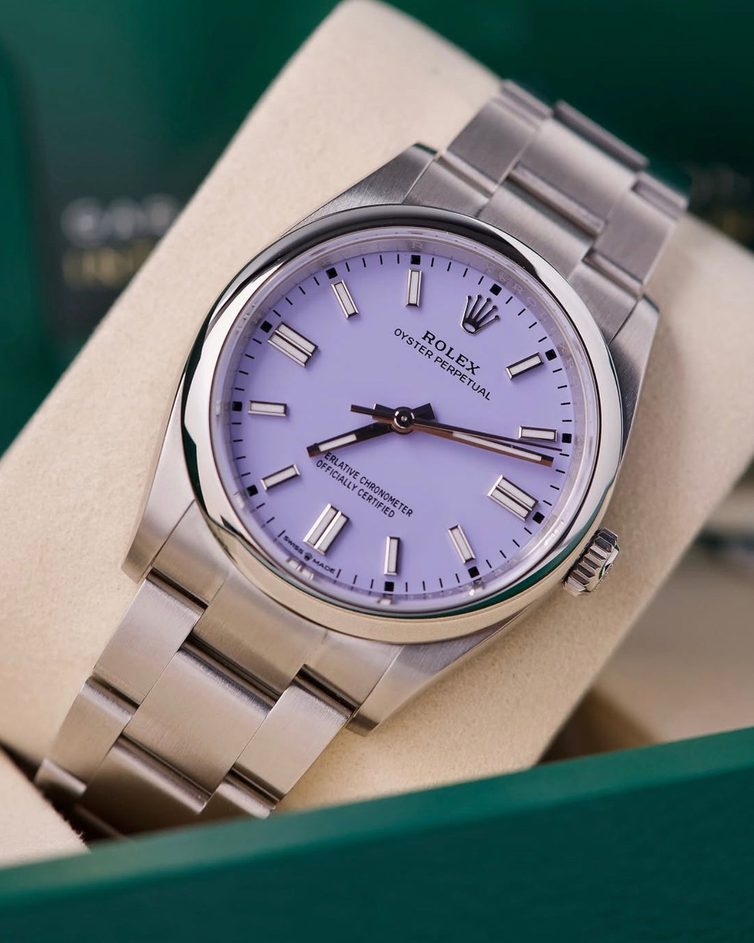 Rolex Oyster Perpetual 36 reference 126000 lavender dial and domed bezel, close angled front view