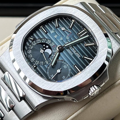 Patek Philippe Nautilus 5712/1A-001 front close-up with blue dial, moon phase and stainless-steel bracelet
