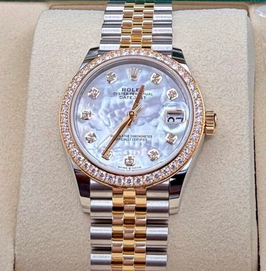 Rolex Datejust 31 Mother-of-Pearl Diamond Dial Jubilee Bracelet 278383RBR, straight-on front view on a display cushion