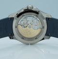 Patek Philippe Aquanaut Travel Time 5164G-001 in white gold with blue dial and blue composite strap, sapphire caseback view of the self-winding movement