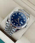 Rolex Datejust 41 126334 right three-quarter close-up on cushion with blue diamond-set dial, fluted bezel and Jubilee bracelet
