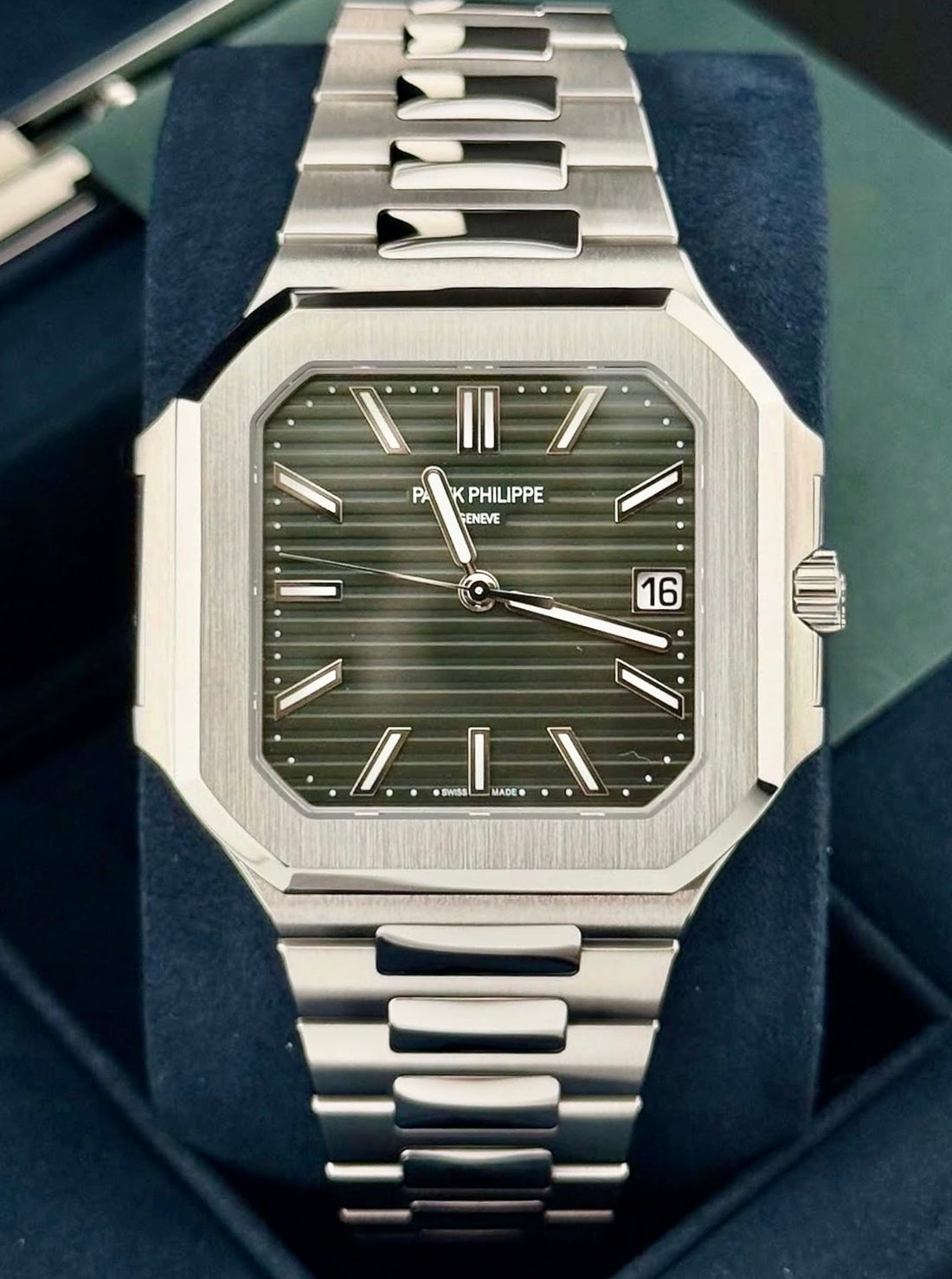 Patek Philippe Cubitus 5821/1A-001 front view with olive-green horizontally embossed dial and steel bracelet