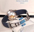 Patek Philippe Aquanaut 5168G-001 in white gold with blue embossed dial and blue composite strap, open deployant clasp and sapphire caseback view