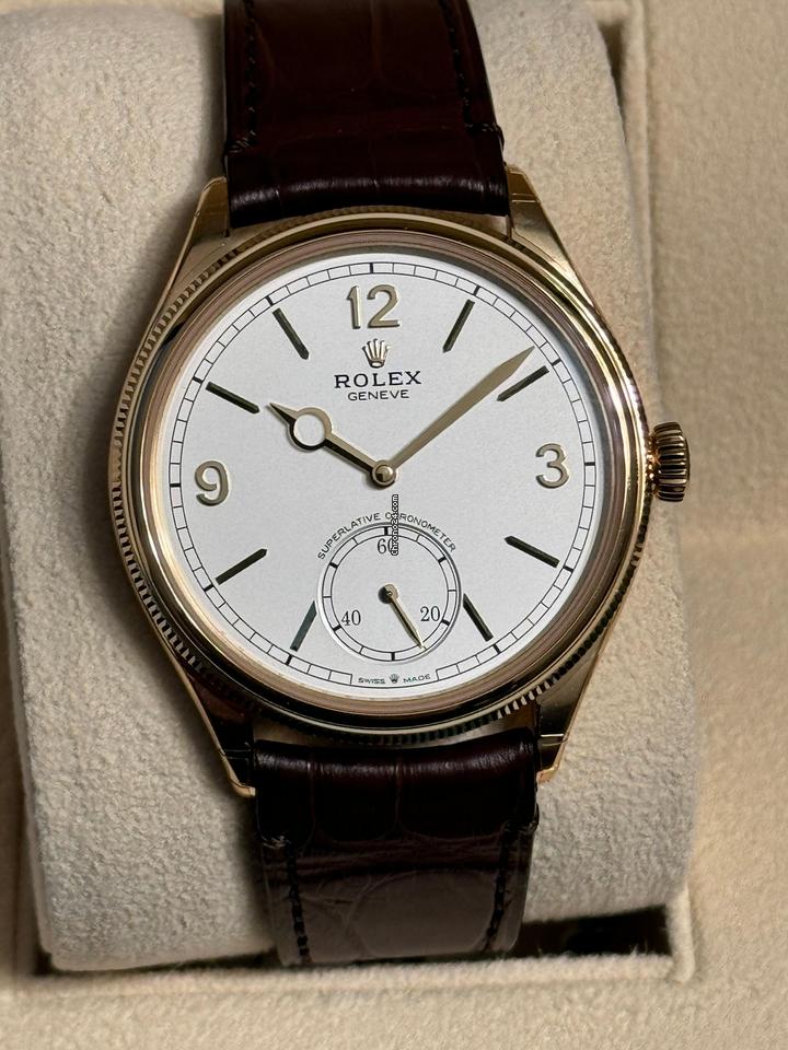 Rolex 1908 reference 52508 white dial in yellow gold on brown alligator leather strap, close front view