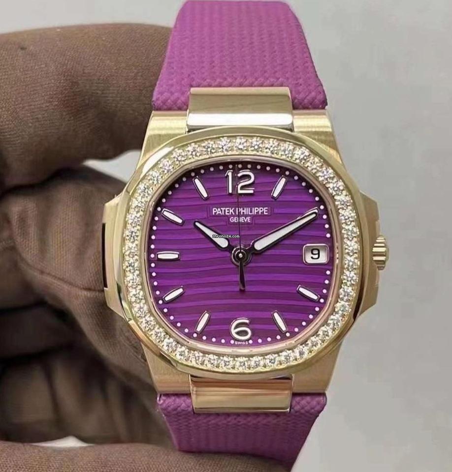 Patek Philippe Nautilus 7010R-013 in rose gold with purple wave-pattern dial and strap