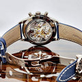 Patek Philippe Chronograph 5172G-001, exhibition caseback view with movement and blue strap visible
