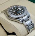 Rolex Yacht-Master 40 ref. 126622 with slate dial, platinum bezel and Oyster bracelet, left-angled front view on a cushion
