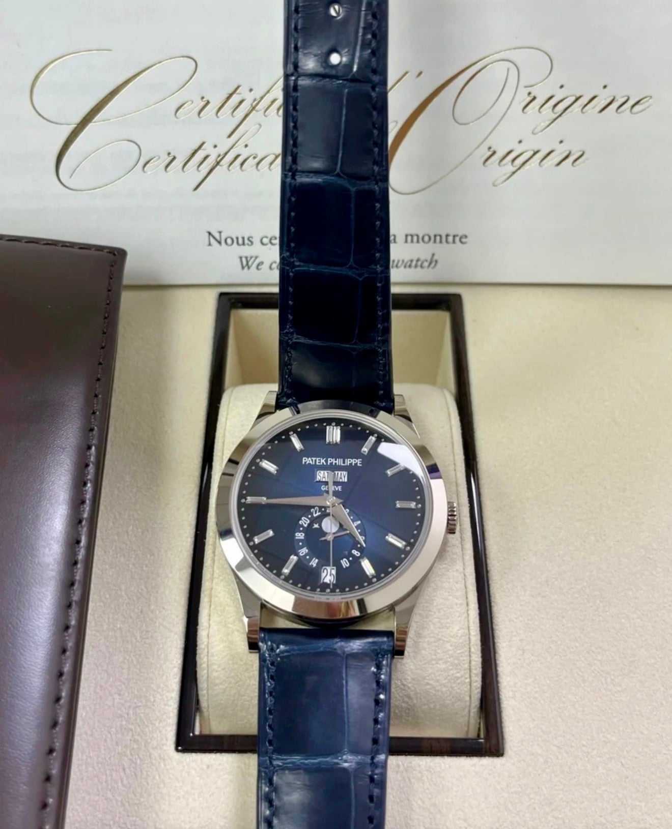 Patek Philippe Annual Calendar 5396G-017 in white gold with blue dial and blue alligator strap, front view with certificate