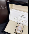 Patek Philippe Aquanaut Luce 5268/200R-001, rose gold, white dial, diamond bezel and white strap, display with box and certificate