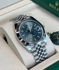 Rolex Datejust 41 126334 White Rolesor, mint-green dial on Jubilee bracelet, angled front view from one side in an open Rolex box