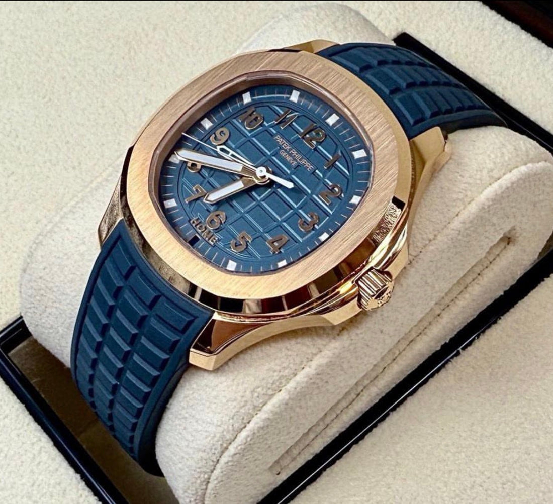 Patek Philippe Aquanaut 5269R-001 in rose gold with blue dial and blue composite strap, angled full-watch front view