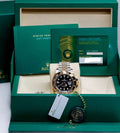 Rolex GMT-Master II ref. 126713GRNR in Yellow Rolesor with black-and-grey Cerachrom bezel and Jubilee bracelet, presentation-box view with card and accessories