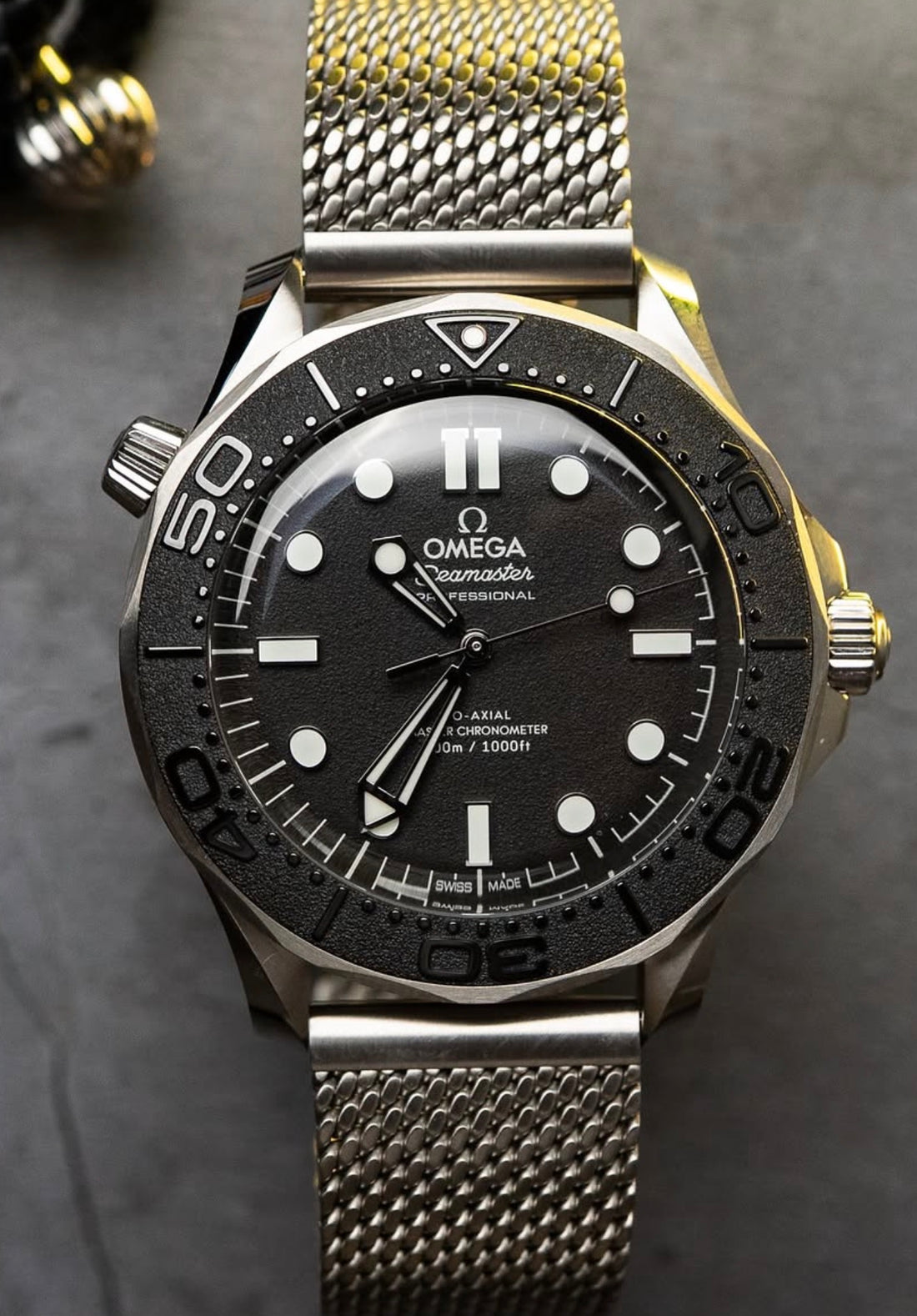 Omega Seamaster Diver 300M Spectre Edition 42 mm — Black Dial Steel Mesh Bracelet 210.30.42.20.01.023