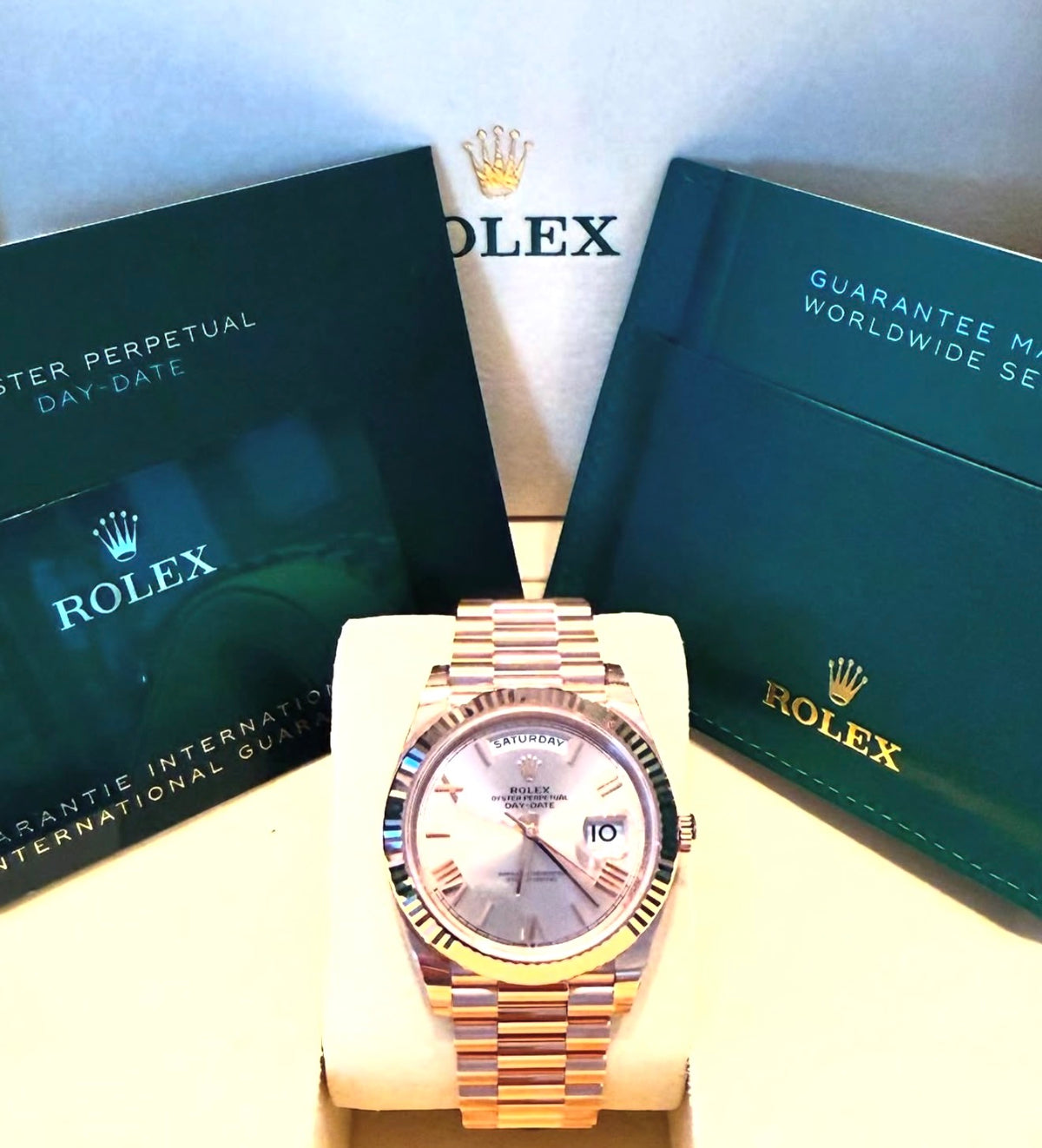 Rolex Day-Date 40 reference 228235 Sundust Roman dial with presentation box and booklets