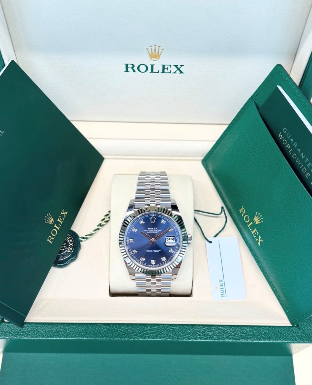 Rolex Datejust 41 Blue Diamond Dial Jubilee 126334, view inside an open Rolex presentation box with warranty card and accessories