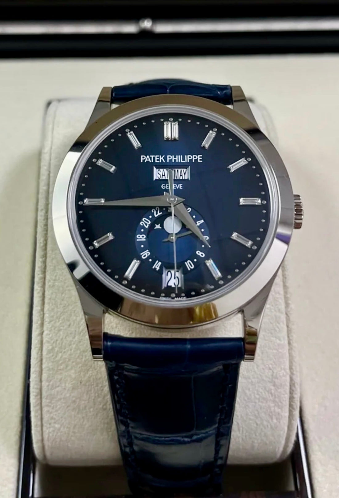 Patek Philippe Annual Calendar 5396G-017 in white gold with blue dial and blue alligator strap, straight-on front view in the presentation box