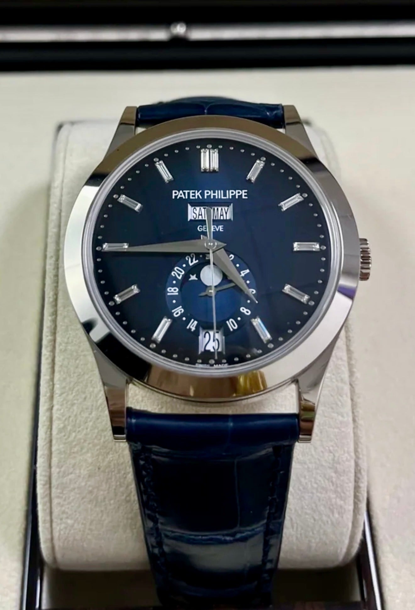 Patek Philippe Annual Calendar 5396G-017 in white gold with blue dial and blue alligator strap, straight-on front view in the presentation box
