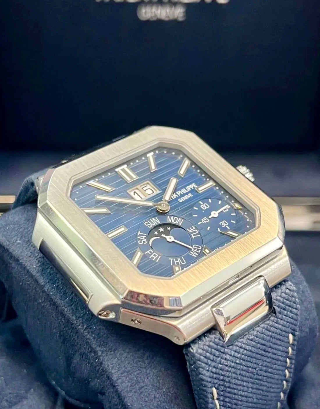 Patek Philippe Cubitus 5822P-001 three-quarter view showing the platinum case, blue dial and navy composite strap