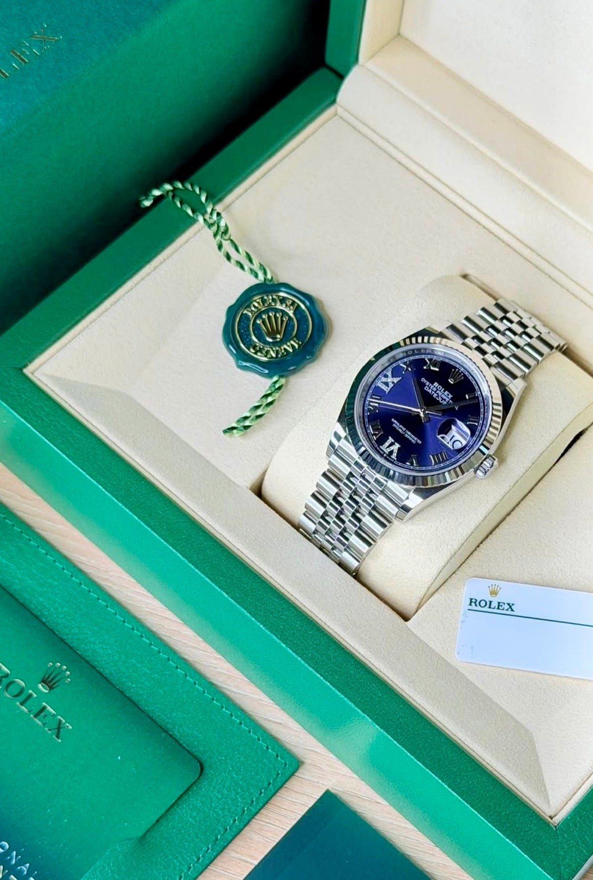 Rolex Datejust 36 126234 with aubergine diamond dial in its green presentation box, with hangtag and Rolex card.