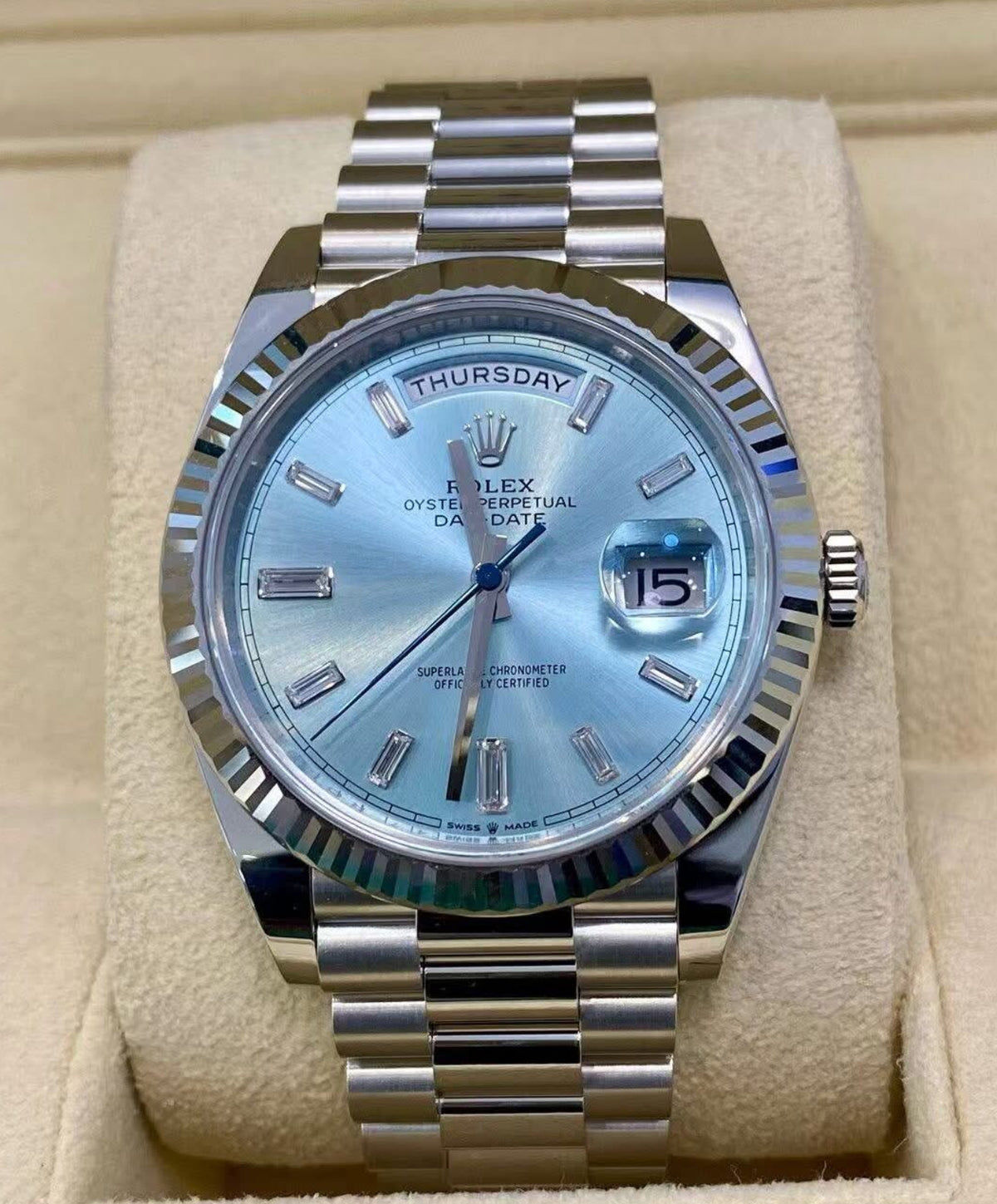 Rolex Day-Date 40 reference 228236 ice-blue baguette-diamond dial in platinum on President bracelet, straight-on front view