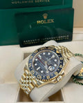 Rolex GMT-Master II 126718GRNR with Tiger Iron dial, yellow-gold Jubilee bracelet, box and card