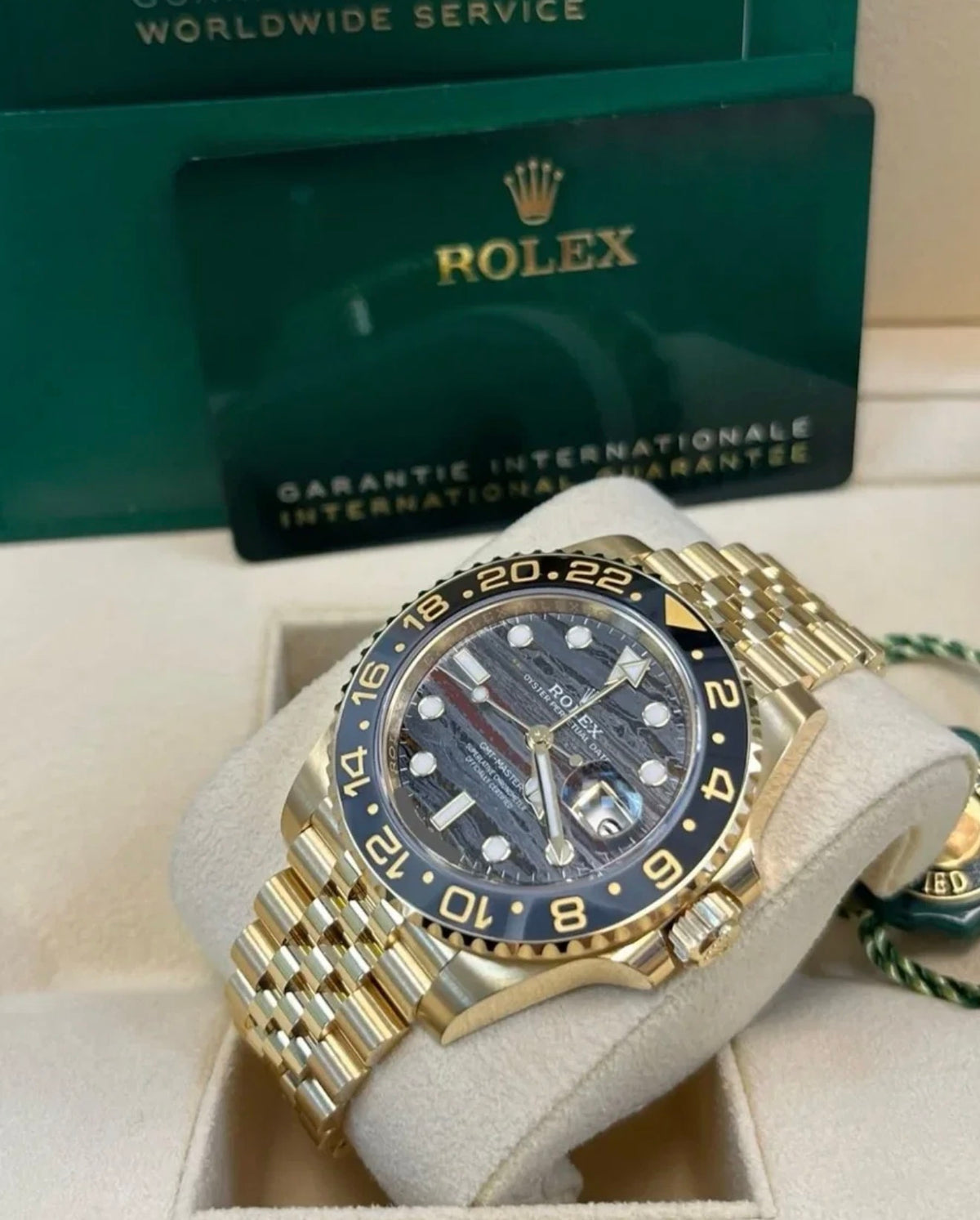 Rolex GMT-Master II 126718GRNR with Tiger Iron dial, yellow-gold Jubilee bracelet, box and card