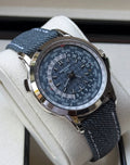 Patek Philippe Complications World Time Date reference 5330G-001 with blue-gray dial and white-gold case