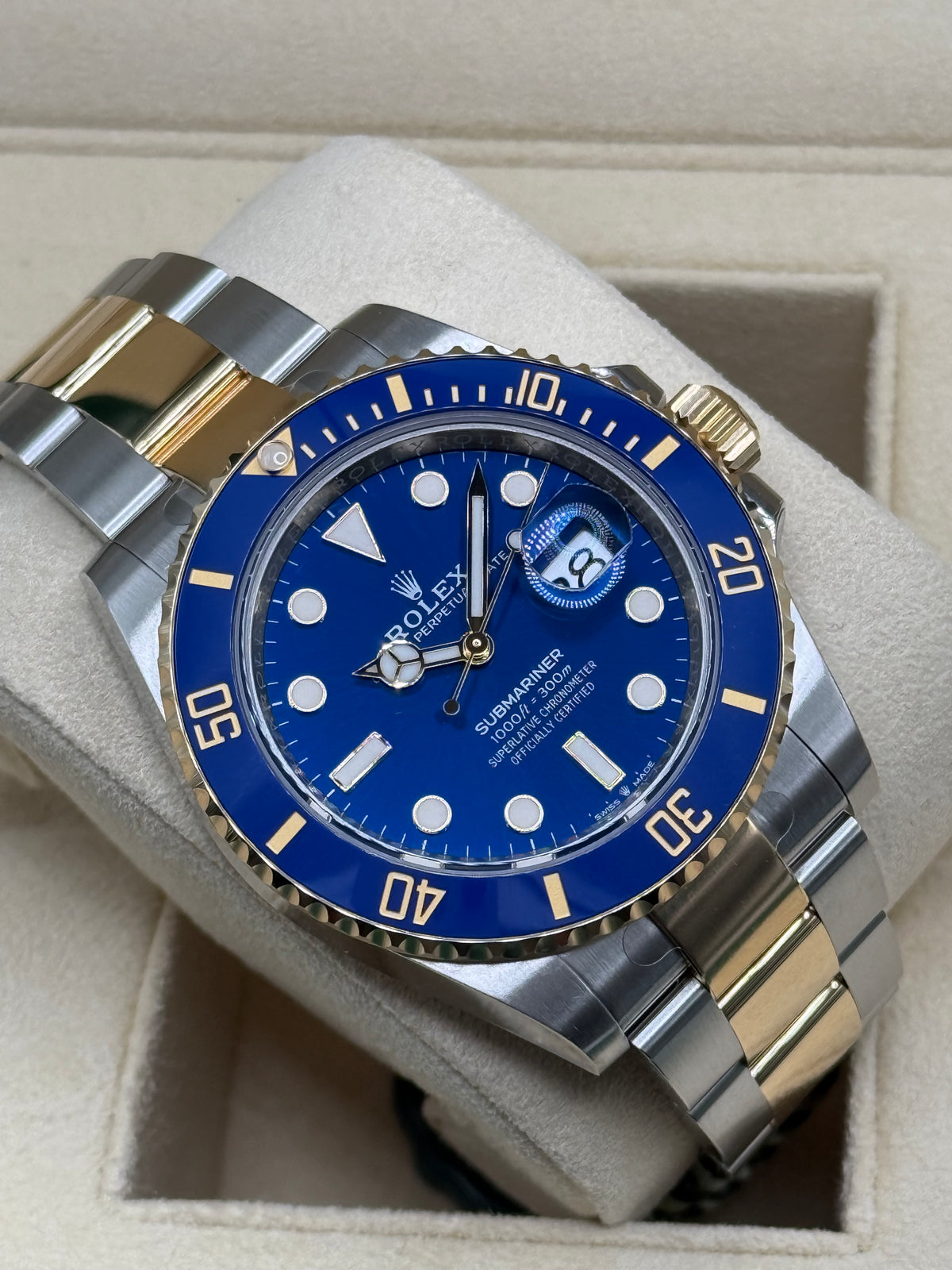 Rolex Submariner Date ref. 126613LB with blue dial, blue Cerachrom bezel and Yellow Rolesor Oyster bracelet, left three-quarter front view