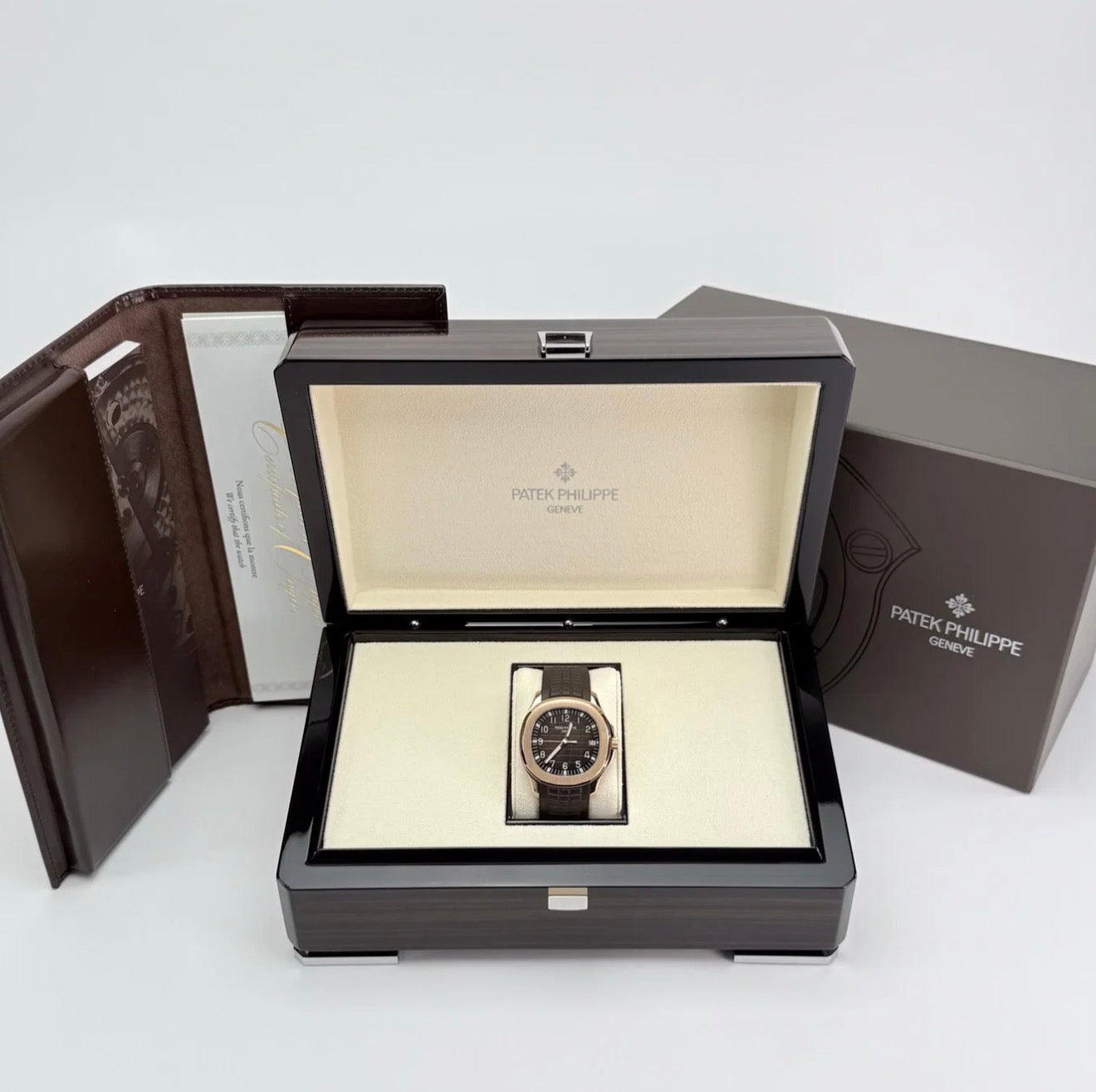 Patek Philippe Aquanaut 5167R-001 front view with box and papers