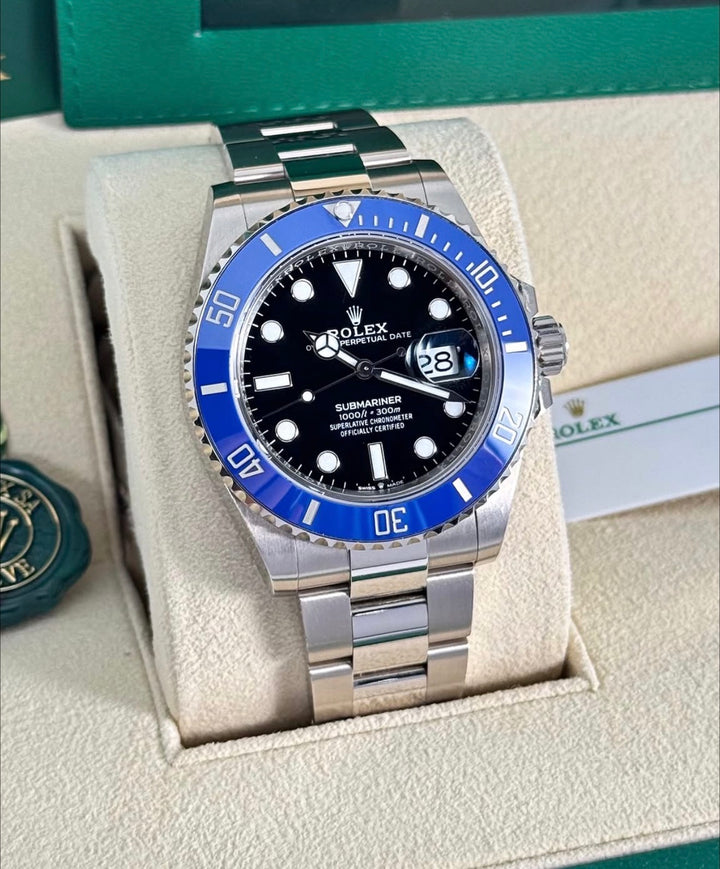 Rolex Submariner Date 126619LB Blueberry in open Rolex presentation box with green seal and card