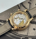 Patek Philippe Celestial 6104R-001 in rose gold with celestial dial, diamond bezel and black strap, movement through sapphire caseback