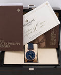 Patek Philippe 24-Hour Travel Time 5224R-001 in rose gold with blue dial and blue calfskin strap, display with presentation box, papers and literature