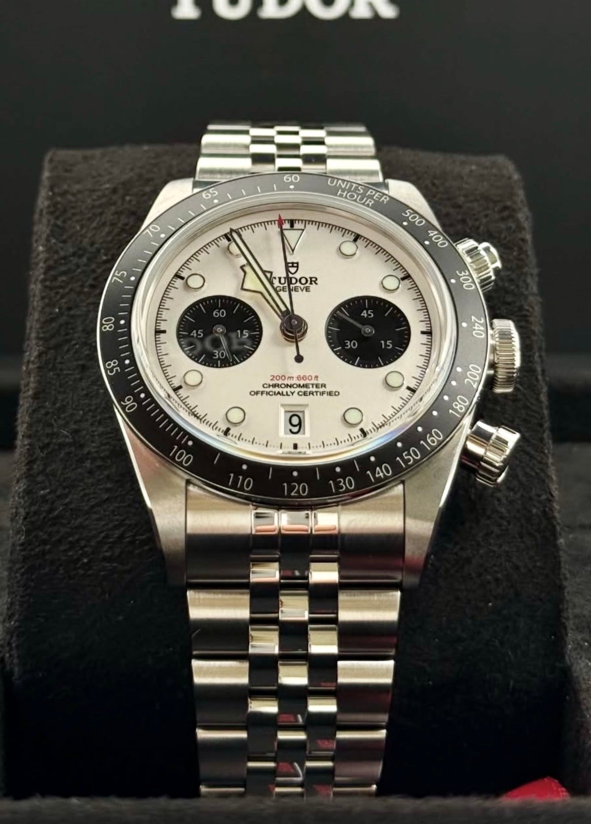 Tudor Black Bay Chrono Panda M79360N-0014 straight-on view on black display cushion