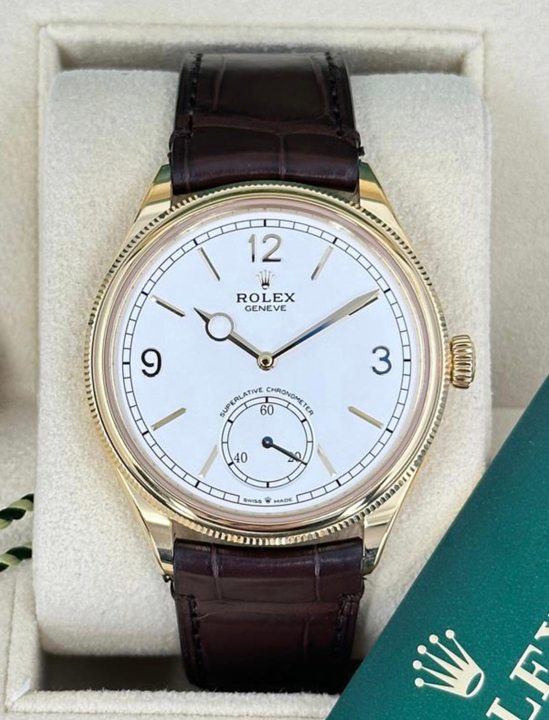 Rolex 1908 reference 52508 white dial in yellow gold on brown alligator leather strap, straight-on front view