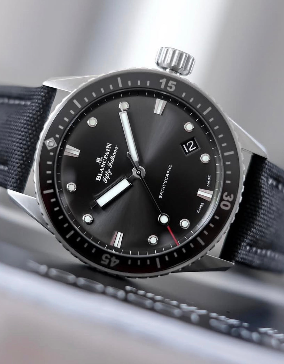 Blancpain watch 5000-1110-B52A — close-up of dark dial, date window and winding crown