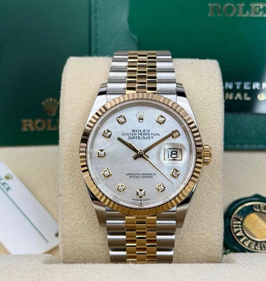 Rolex Datejust 36 Mother-of-Pearl 126233, front view inside an open Rolex presentation box