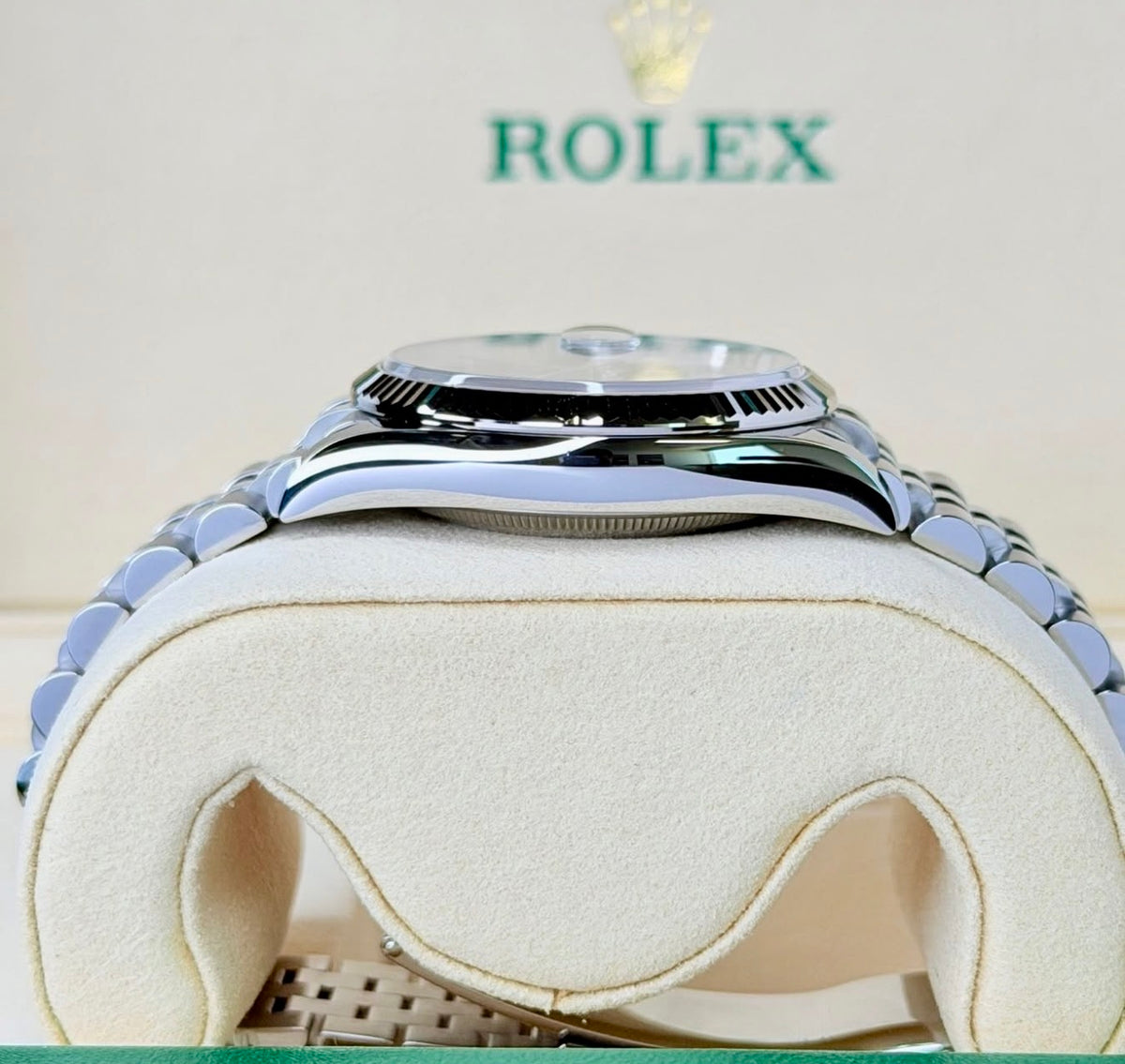 Left-side profile of the Rolex Datejust 36 126234 showing the polished Oystersteel case, fluted bezel and raised crystal.