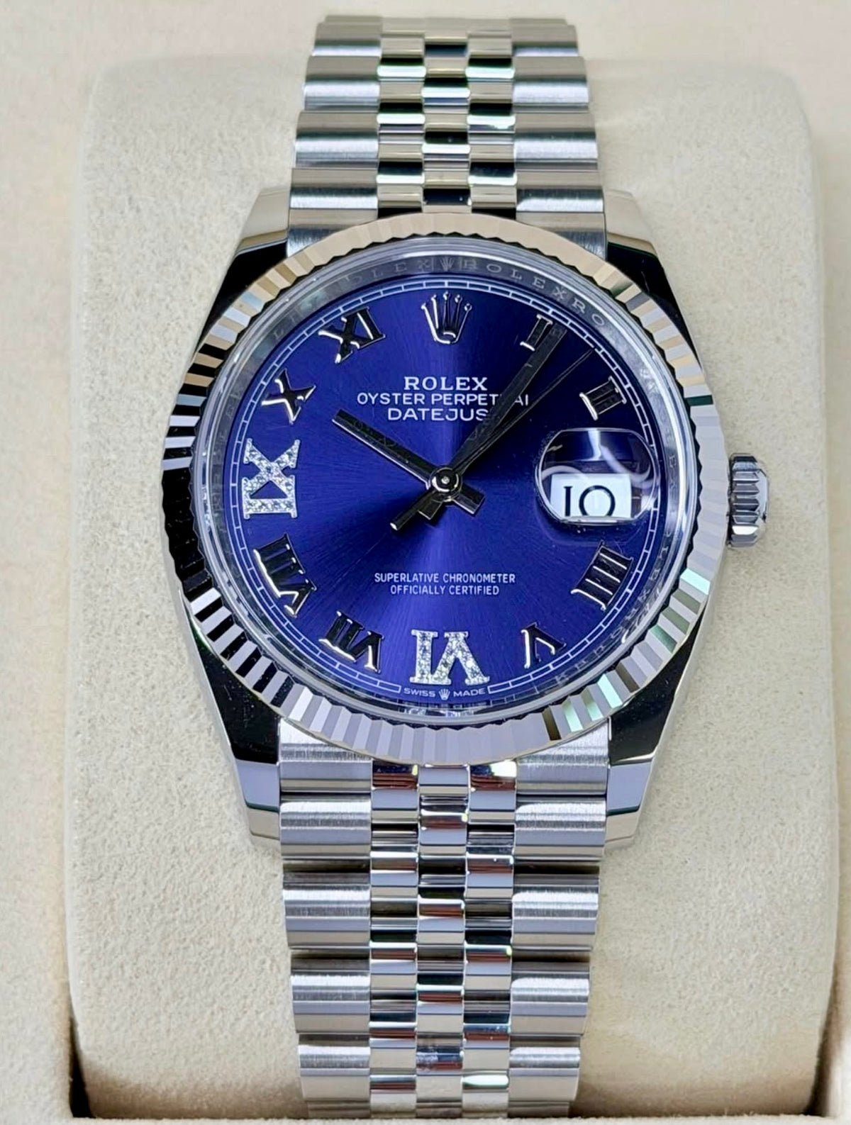 Front view of the Rolex Datejust 36 126234 showing its aubergine sunray dial, diamond VI and IX numerals and Cyclops date lens.