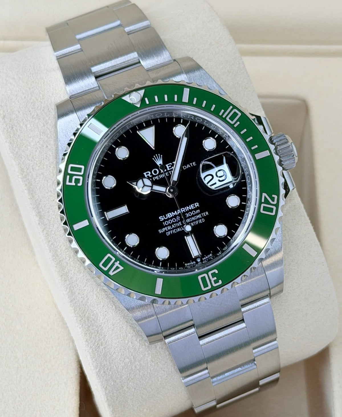 Rolex Submariner Date 126610LV black dial and green bezel, three-quarter front view from crown side