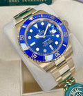 Rolex Submariner Date reference 126618LB blue dial and blue Cerachrom bezel on yellow-gold Oyster bracelet, three-quarter front view